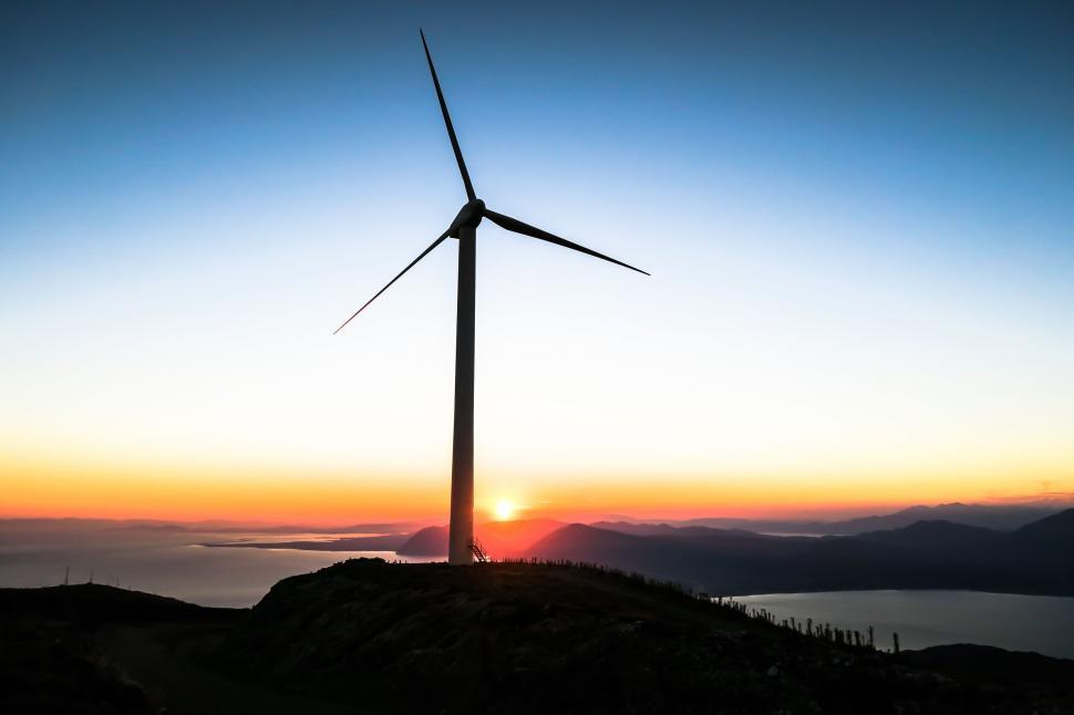 Free Image of Silhouetted wind turbine at sunset 