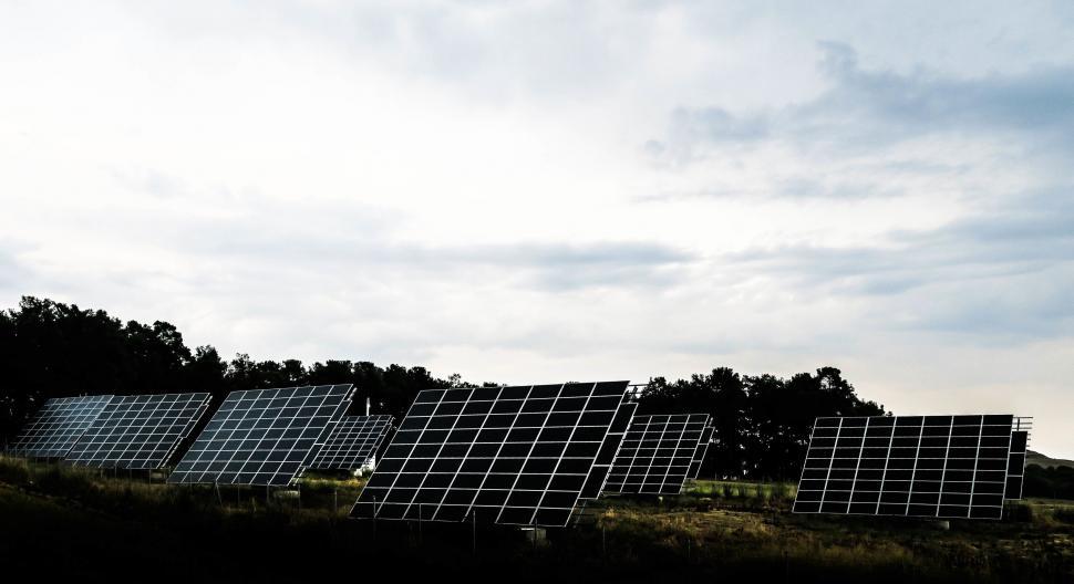 Free Image of Solar panels in the countryside at dusk 
