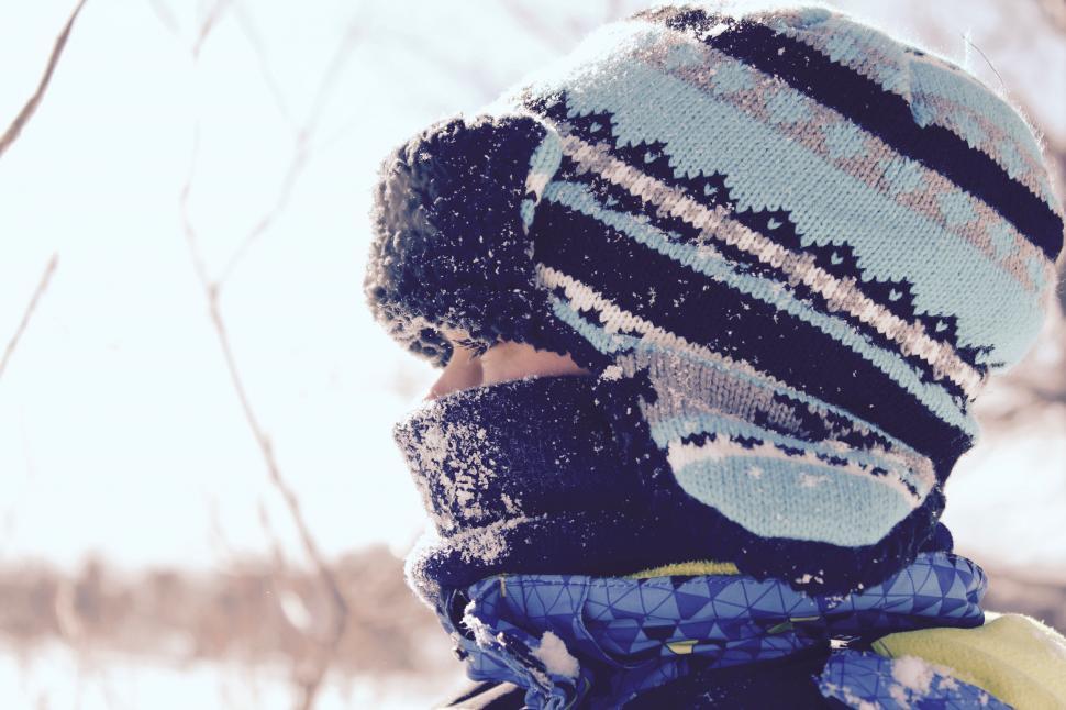 Free Image of Child in winter gear looking away 