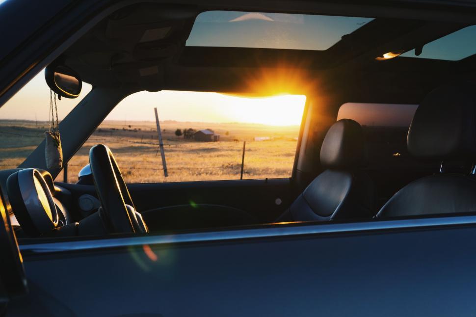 Free Image of Sunset seen from inside a car 