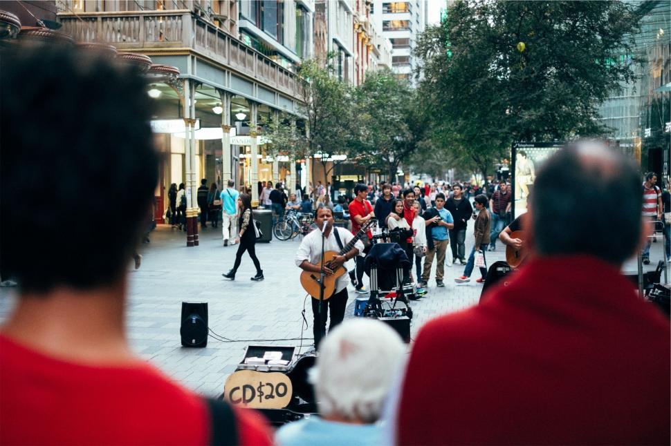 Free Image of Street musician performing for a crowd 