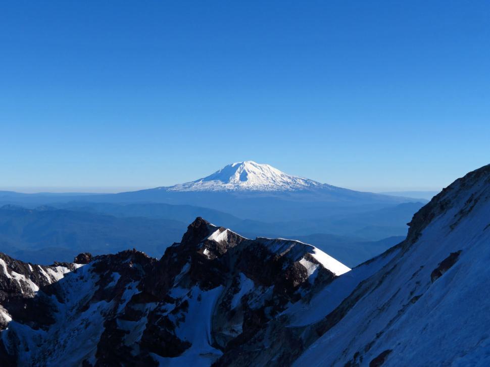 Free Image of Mountain peak with clear blue sky 