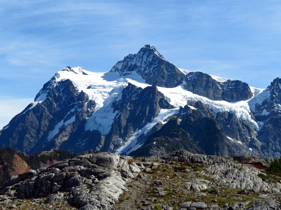 Free Image of Snow-capped mountain with rocky terrain 