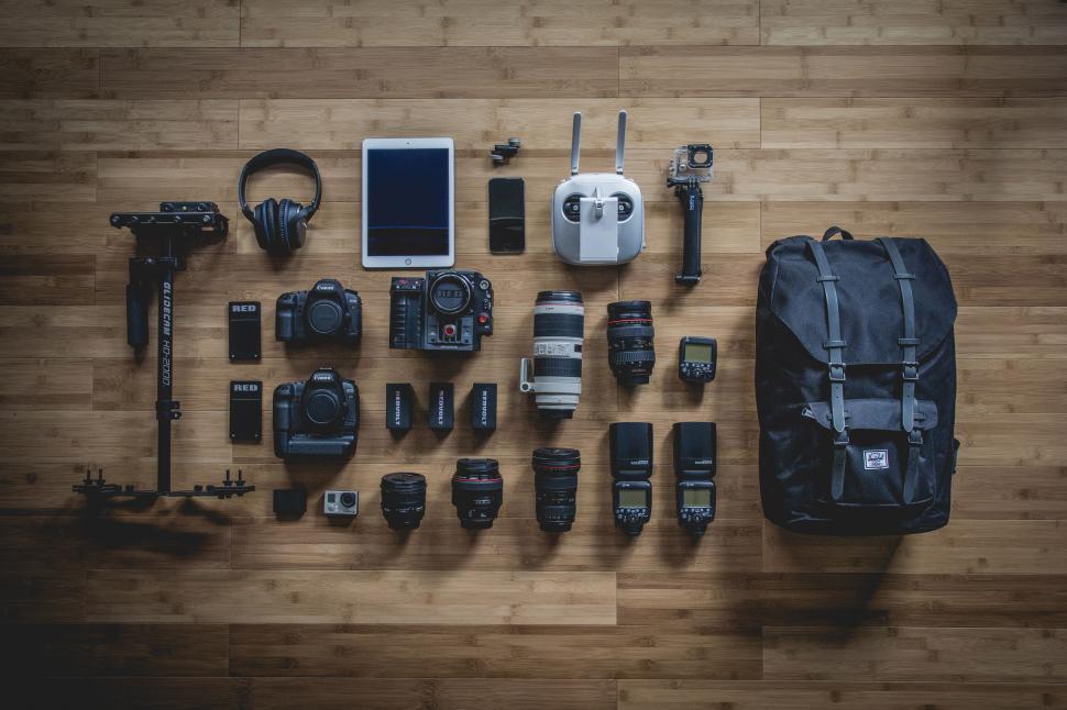 Free Image of Photography equipment arranged on wooden floor 