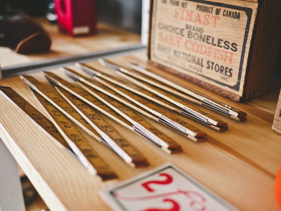 Free Image of Vintage style rulers and a wooden box 