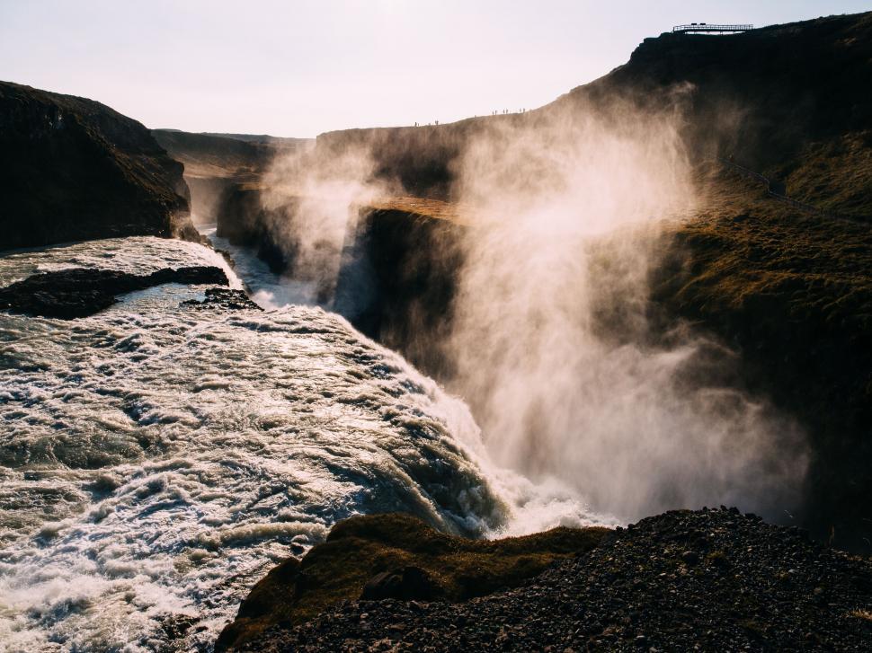 Free Image of Powerful waterfall in dramatic landscape 