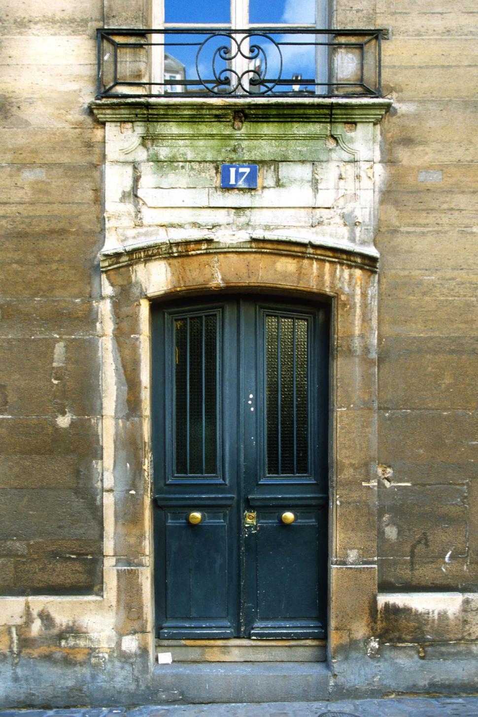 Free Image of door doorway european europe france french balcony entryway entrance stone old seventeen 17 address weathered 