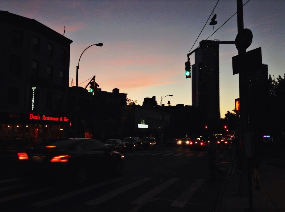 Free Image of Urban twilight scene with silhouette buildings 