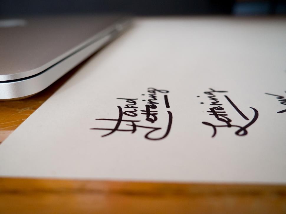 Free Image of Closeup of calligraphy practice on paper 