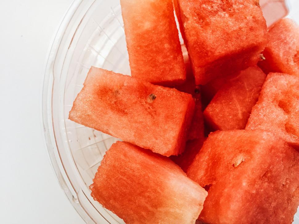 Free Image of Fresh watermelon slices in a plastic tub 