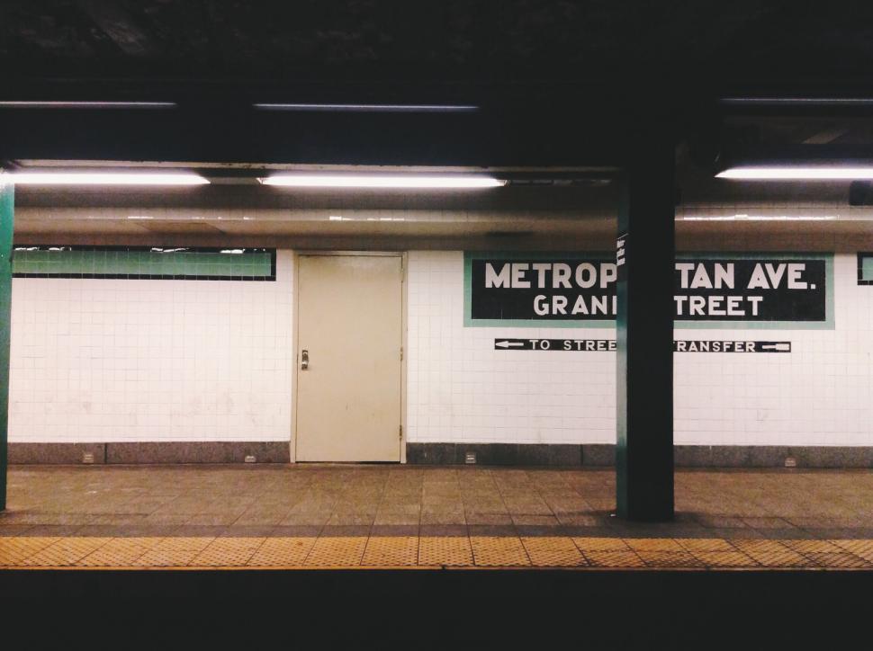 Free Image of Subway station platform with empty bench 