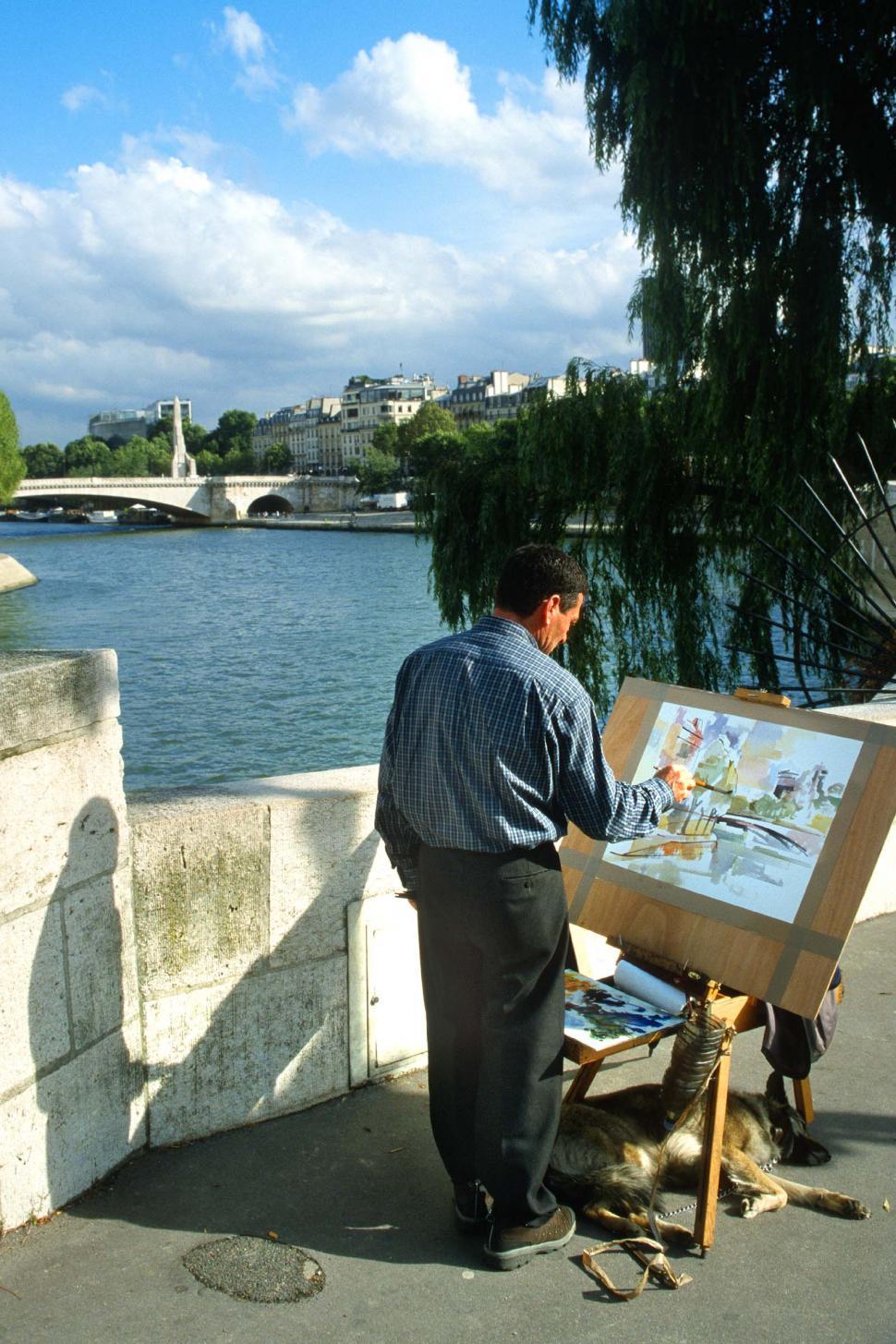 Free Image of france painter painting man artist river seine sleeping dog french europe european paris plen aire paint 