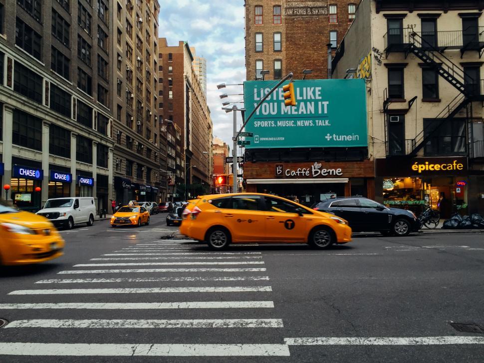 Free Image of Busy New York street with yellow cabs 