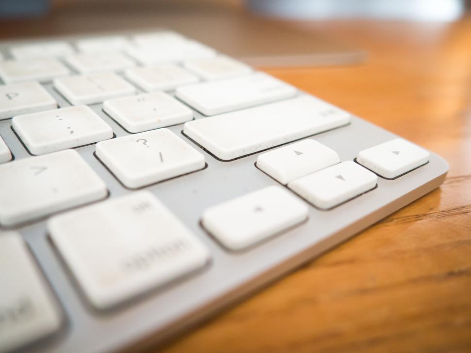 Free Image of Close-up of a dirty white keyboard 