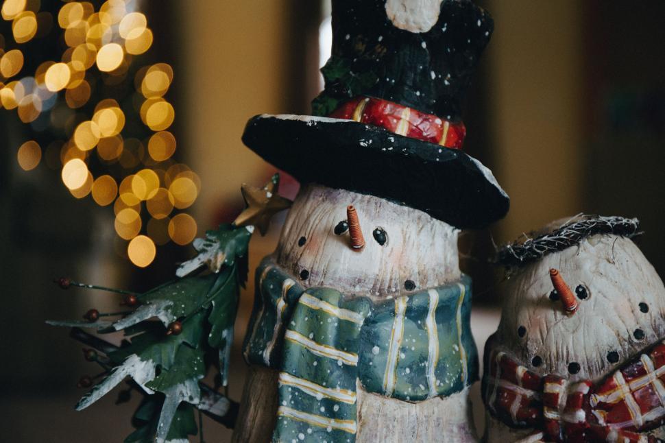 Free Image of Decorative snowmen figures in festive setup 