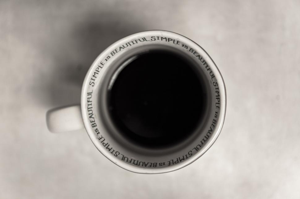 Free Image of Monochrome image of coffee mug with text 