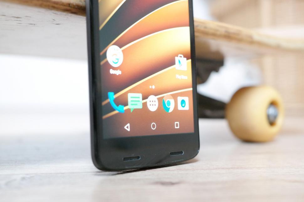 Free Image of Smartphone with icons on wooden skateboard 