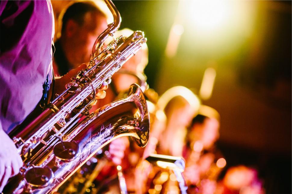 Free Image of Musicians playing saxophones on stage 