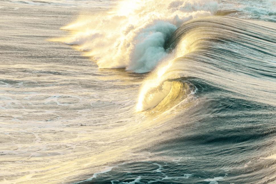 Free Image of Golden wave crest at sunrise 