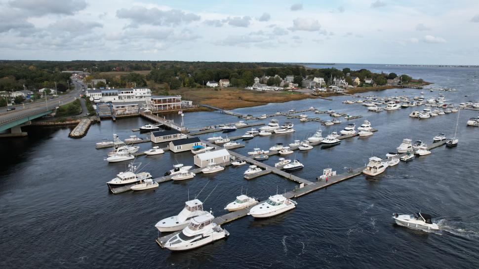 Free Image of Aerial view of marina with boats and street 
