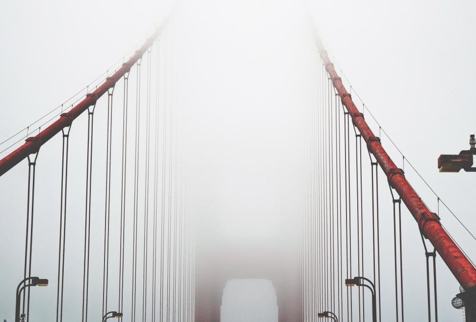 Free Image of Foggy bridge with suspended cables 