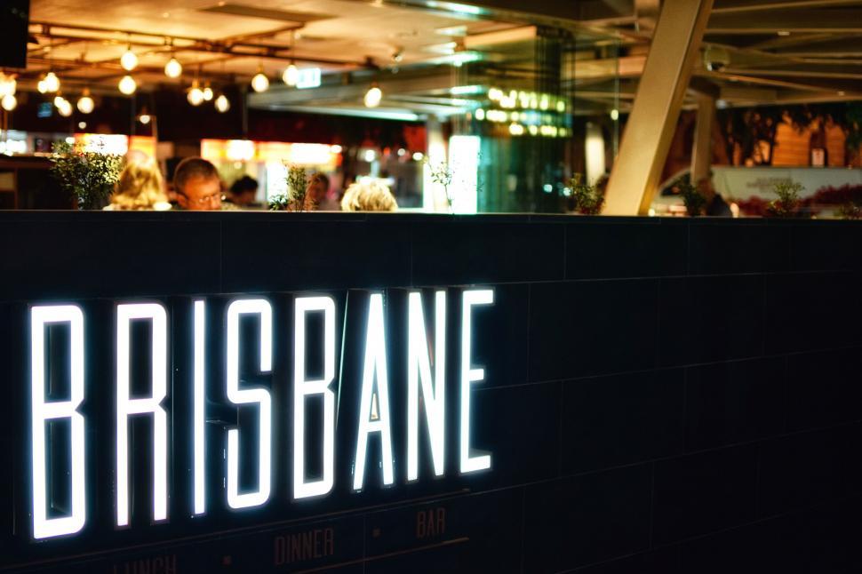 Free Image of Illuminated Brisbane sign in a bar 