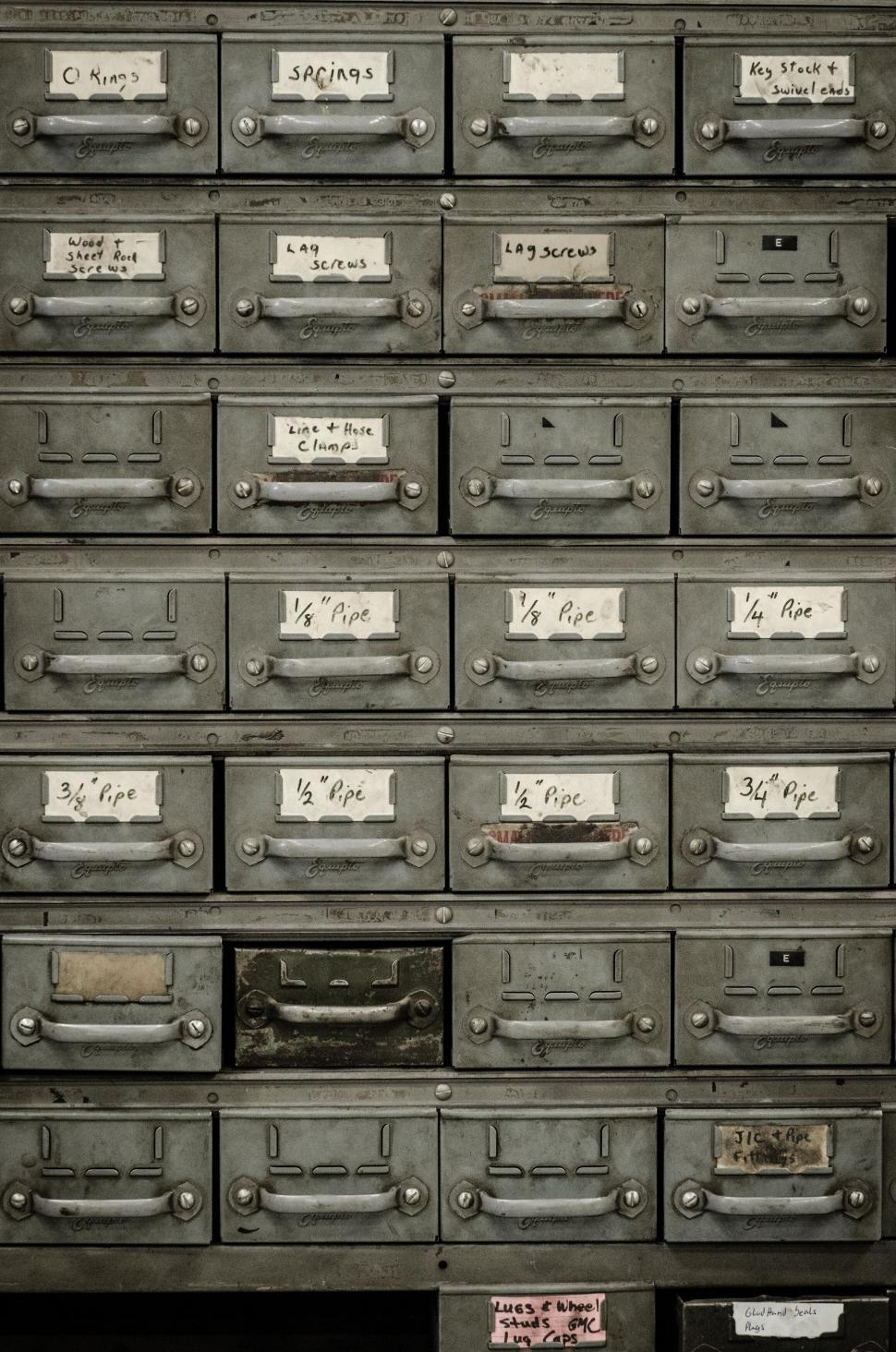 Free Image of Antique label drawers with handwritten labels 