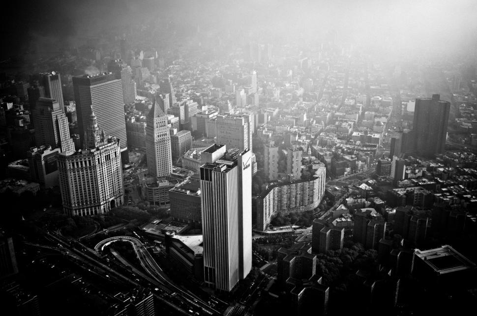 Free Image of Gloomy cityscape with skyscrapers and haze 