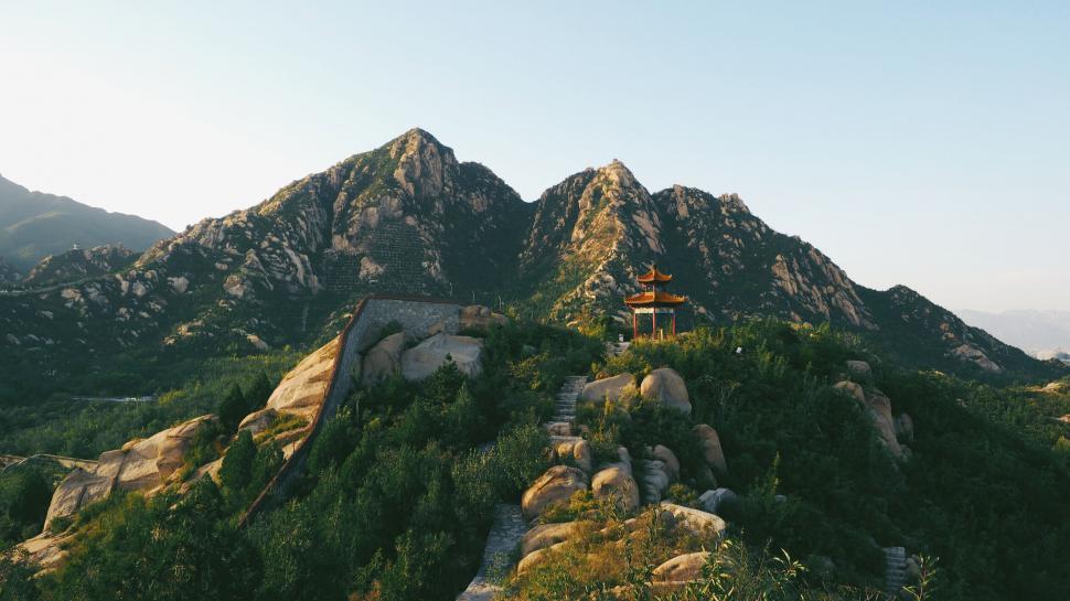 Free Image of Scenic view of a pavilion in lush mountains 