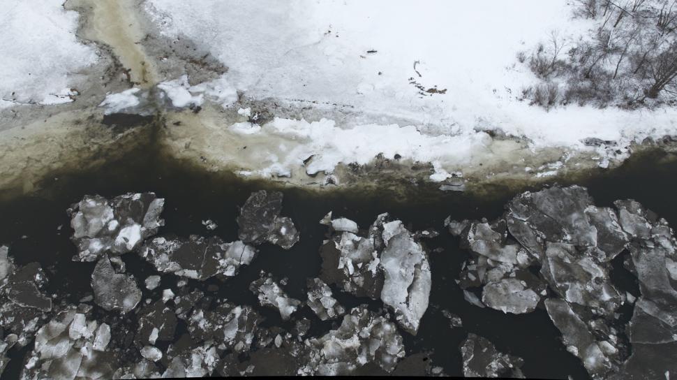 Free Image of Icy river with floating blocks of ice during winter 