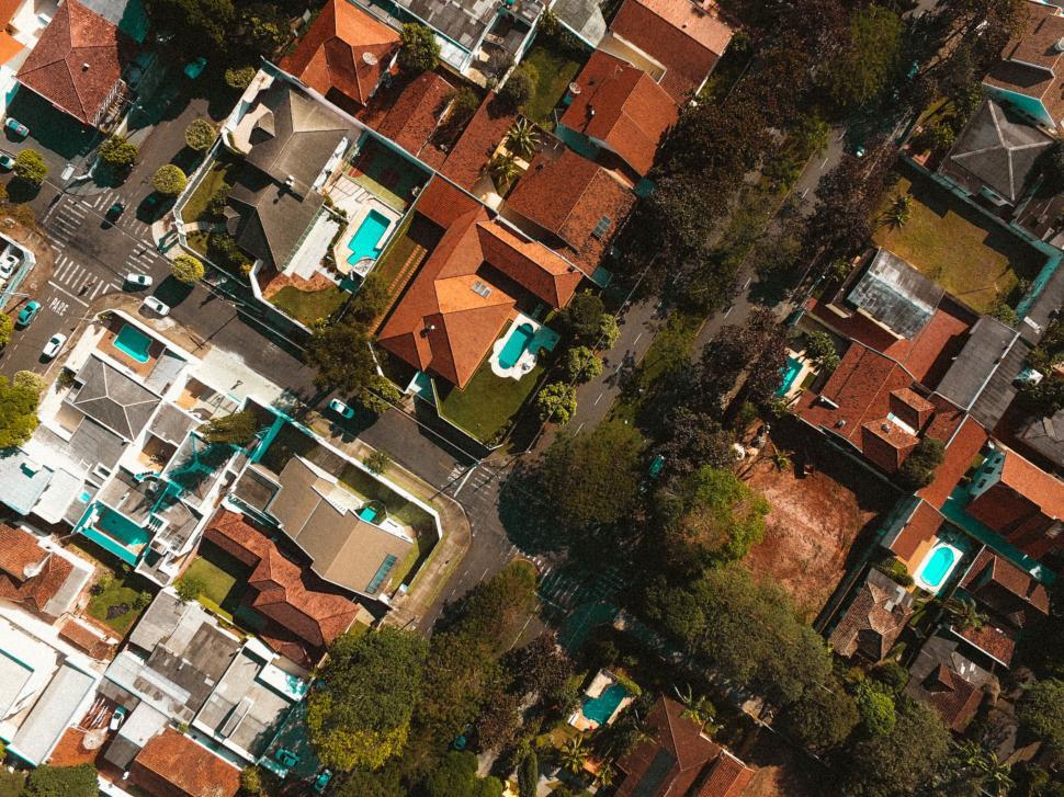 Free Image of Aerial view of suburban neighborhood with diverse houses. 