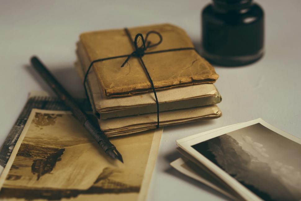 Free Image of Vintage letters and photos on a desk nostalgic image 