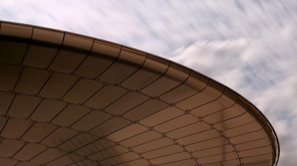 Free Image of Close-up of curved, modern architectural structure roof. 