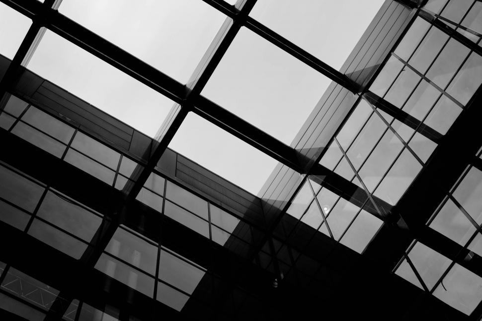 Free Image of Modern architectural glass ceiling view from below 