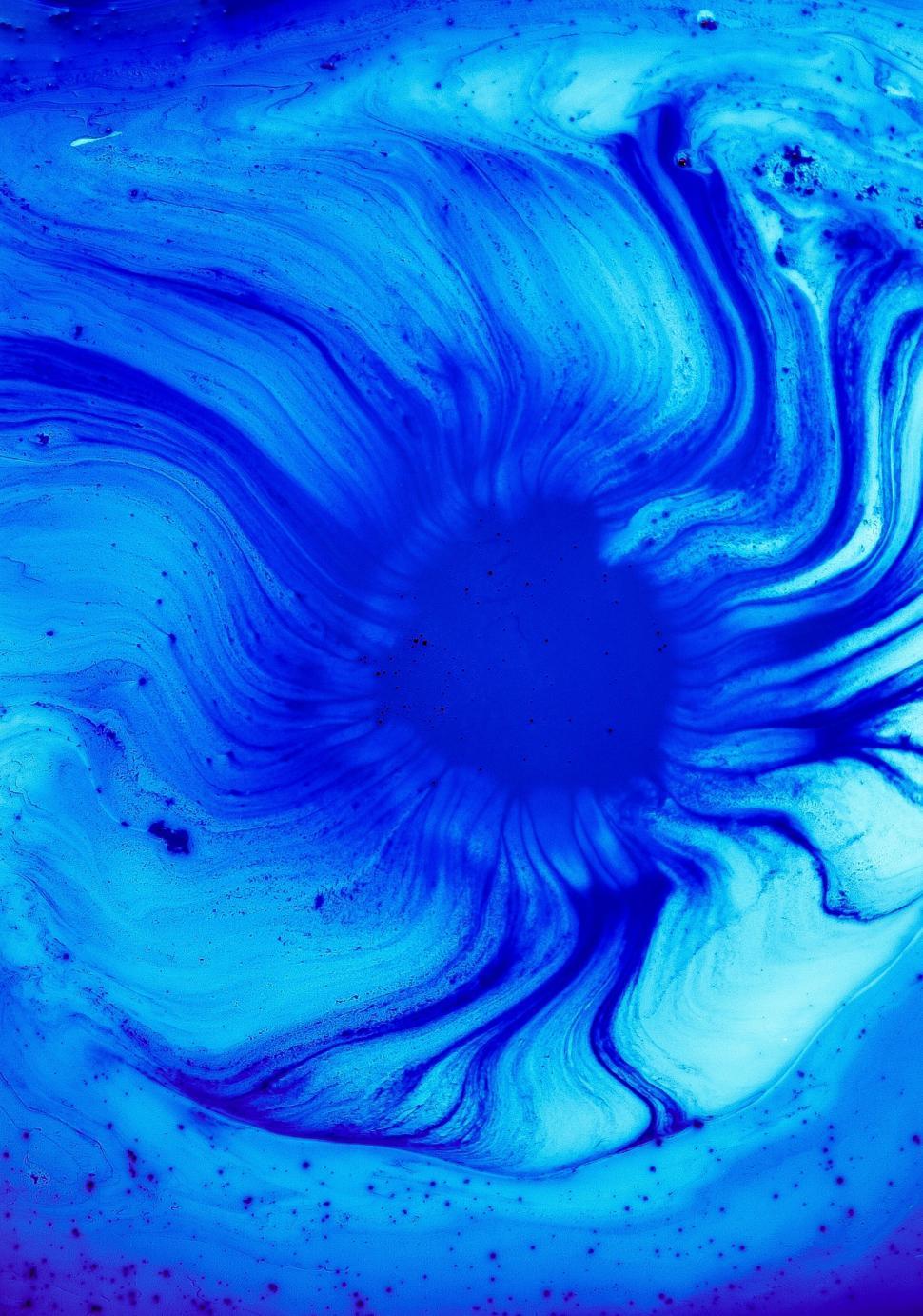 Free Image of Vivid blue swirl with intricate and bold patterns 