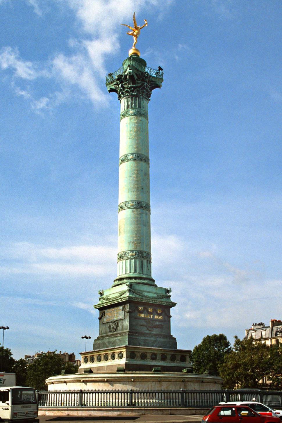 Free Image of Monument With Statue Atop 