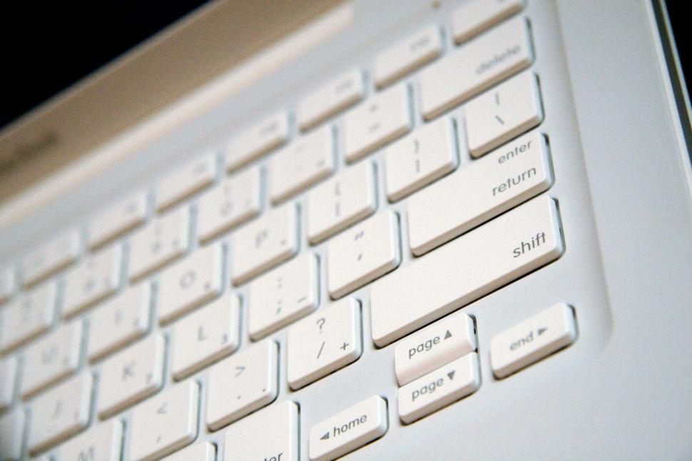Free Image of apple macbook laptop computer keyboard technology macintosh shift keys return enter navigation page up page down buttons 