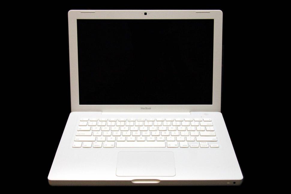 Free Image of White Laptop Computer on Table 
