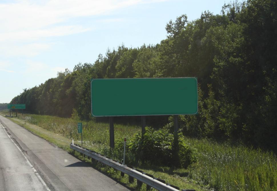 Free Image of Highway Sign Alongside Road 