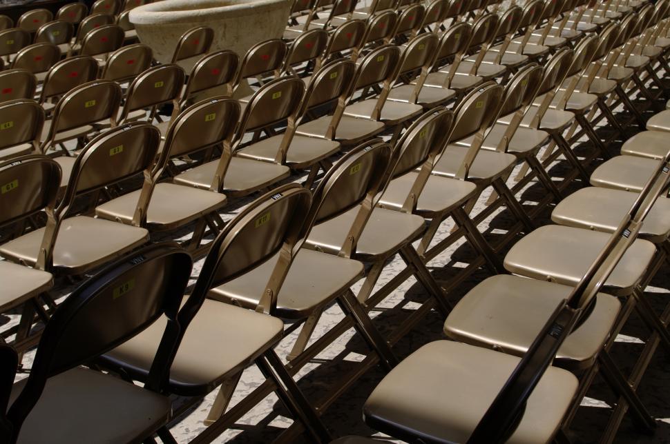 Free Image of Row of Empty Chairs in a Stadium 