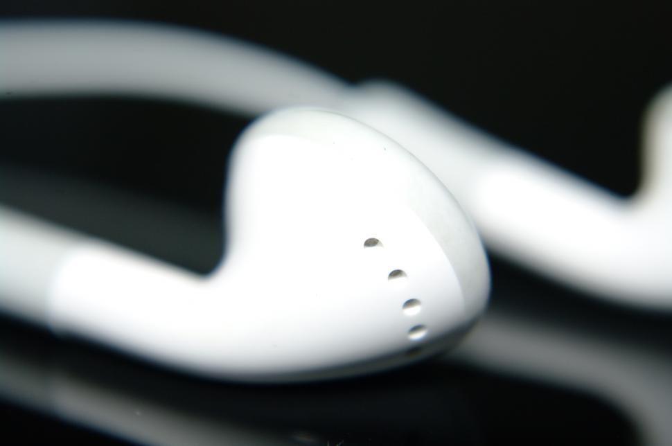 Free Image of White Ear Buds on Table 