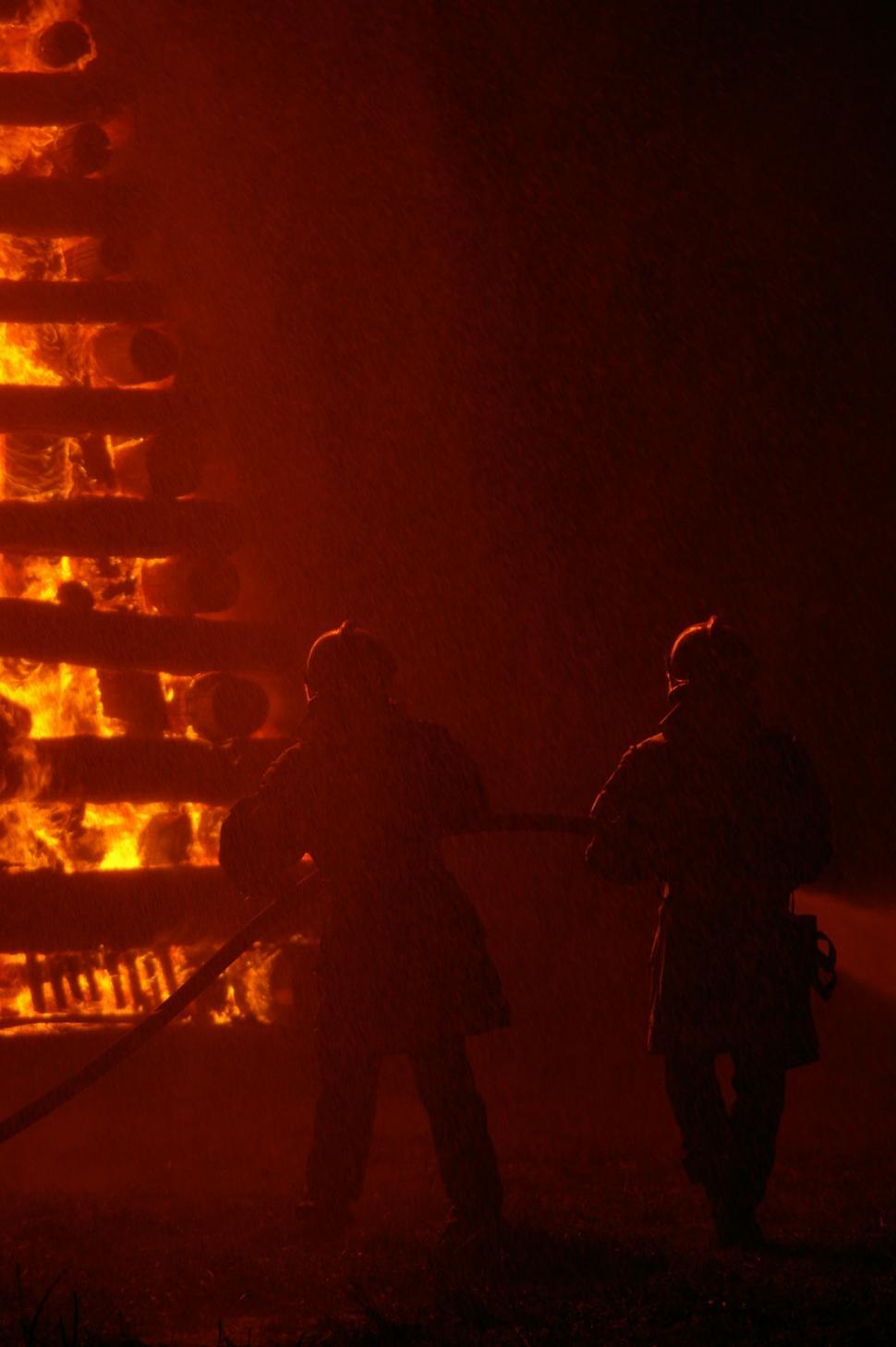 Free Image of Two Firefighters Battling Flames 