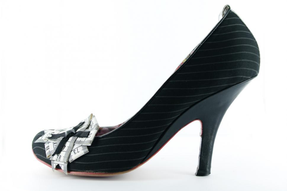 Free Image of Womans Black High Heel Shoe With Bow 