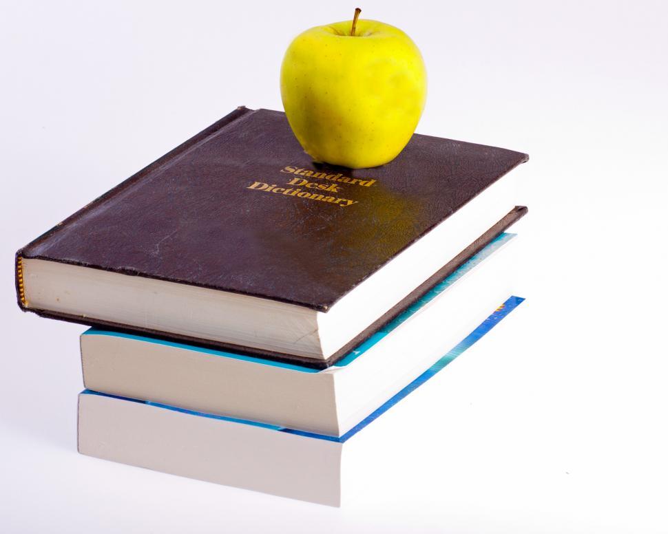 Free Image of Apple and Textbooks 