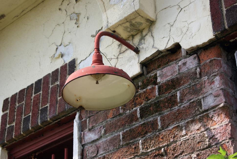 Free Image of Old lamp on a building  
