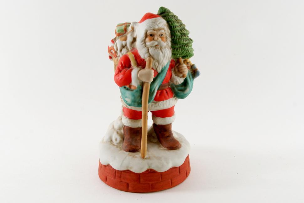 Free Image of Santa Claus Figurine Holding Cane 