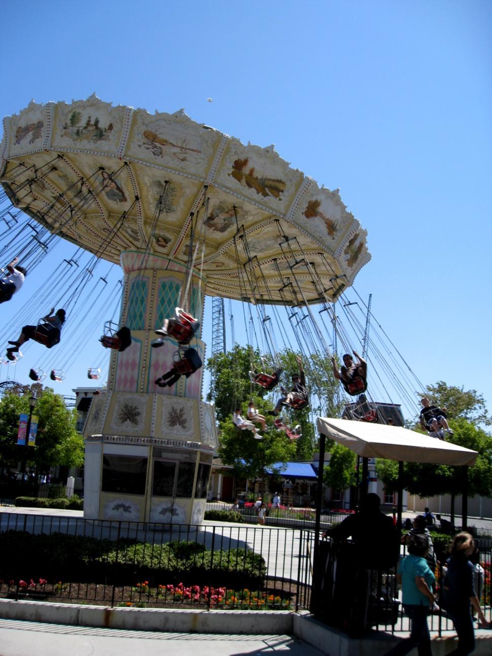 Free Image of A Merry Go Round in a Park on a Sunny Day 