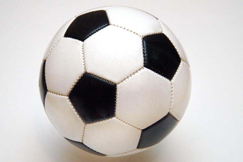 Free Image of soccer balls football black and white stitched panels inflated toys games sports sewn round sphere spherical circular kicked recreation 