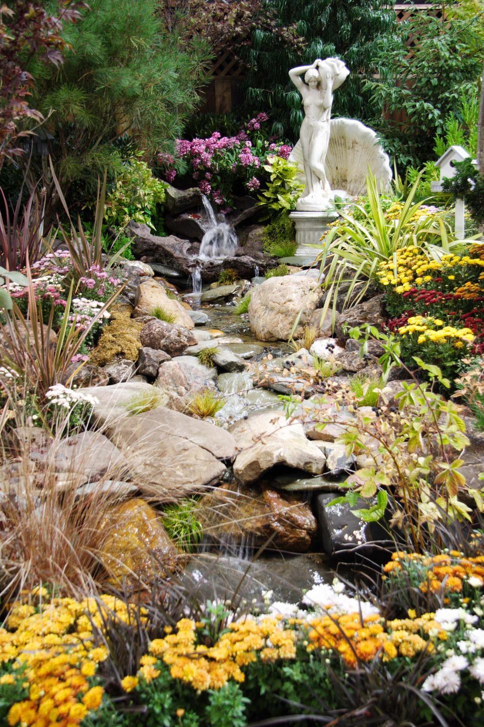 Free Image of Statue and Fountain - Man-Made Garden 