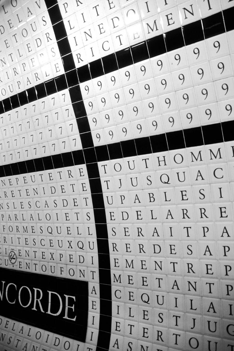 Free Image of france metro station concorde text writing tiles letters black and white walls french tiled subway transportation europe european paris public art Universal Declaration of Human tunnel 